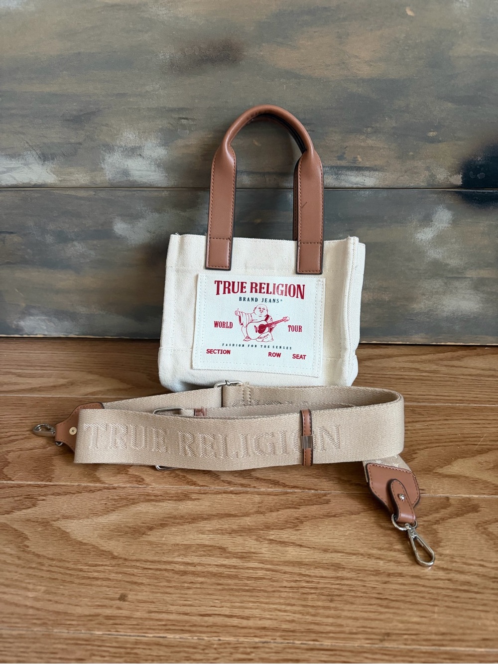 NWOT True Religion Cream Canvas Mini Messenger with Tan Leather Handles